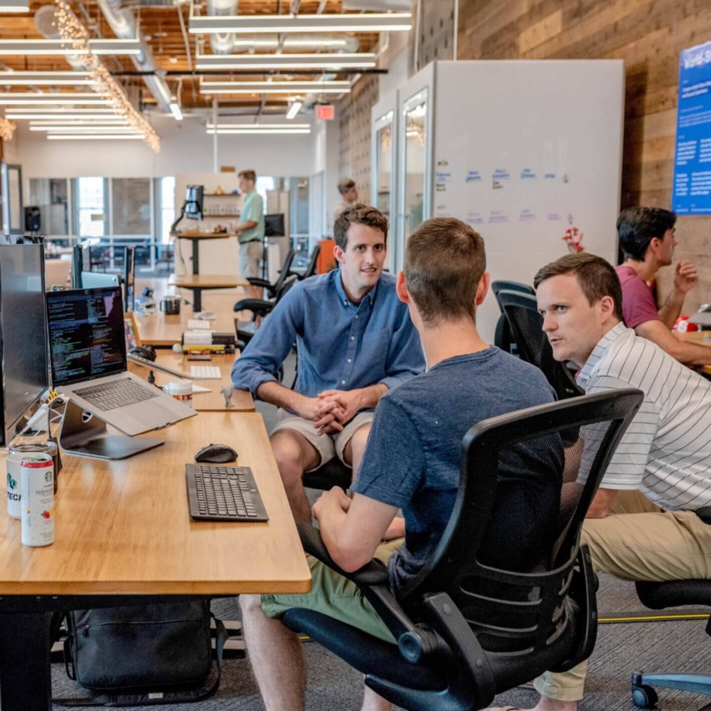 People at an office discussing