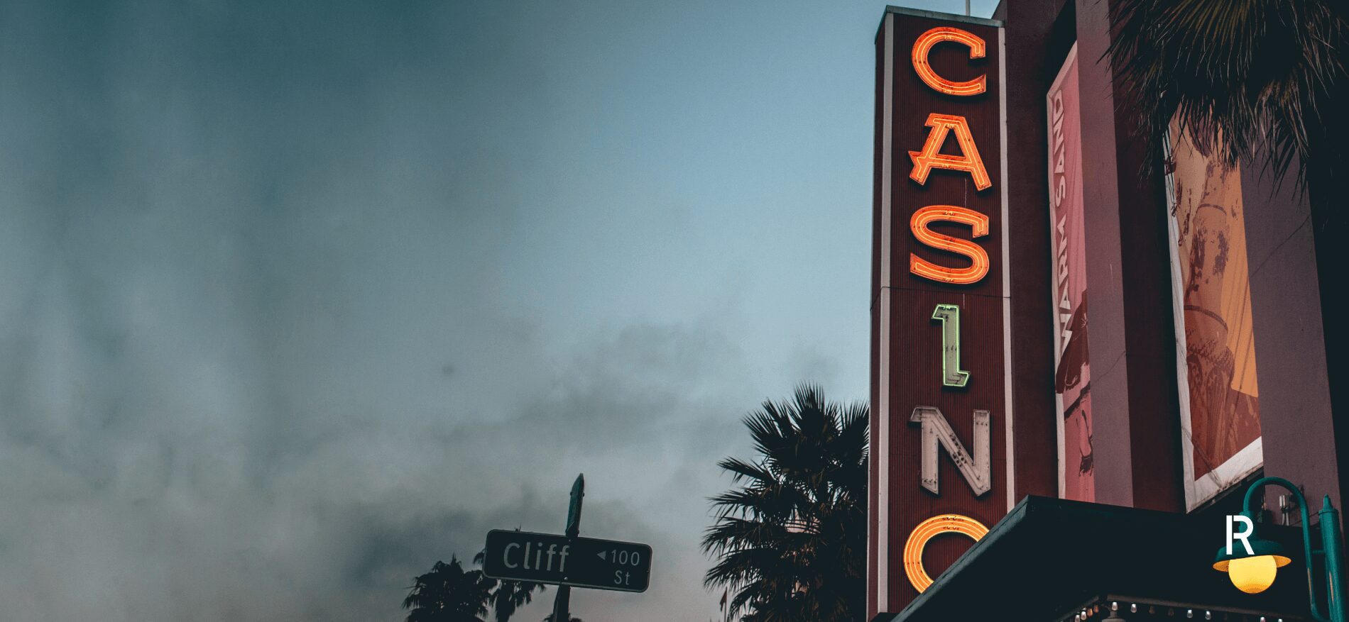 Weathered down Casino sign on an overcast day
