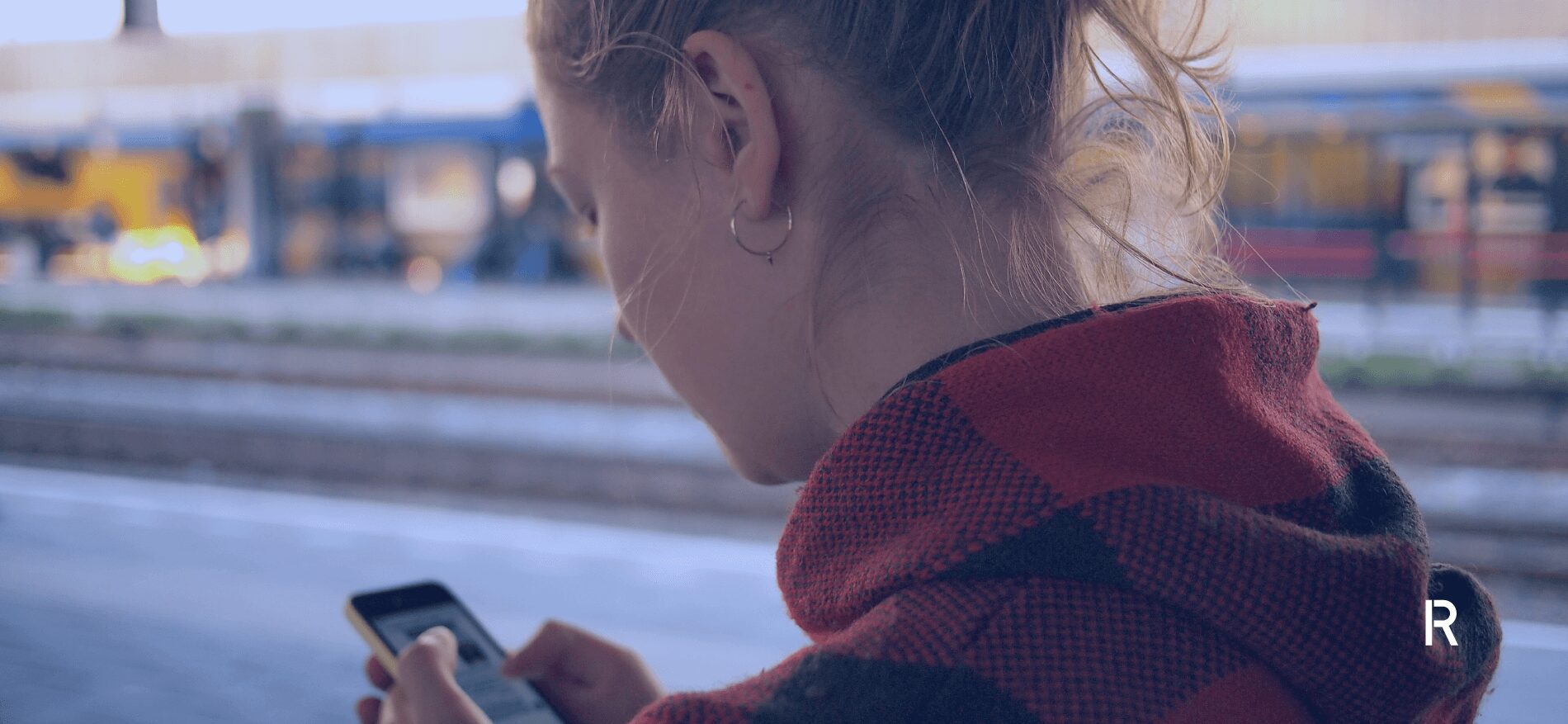 Young woman using her mobile phone