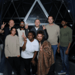 Group of Roboyan's at an event smiling at camera