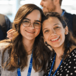 Two Roboyan's smiling at the camera